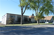 701 Washington St., a Late Gothic Revival school – elem/middle/jr high/high, built in Grafton, Wisconsin in 1950.