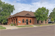 119 N WASHINGTON AVE, a Romanesque Revival library, built in Washburn, Wisconsin in 1893.