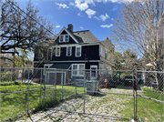 2422-2424 W KILBOURN, a Queen Anne duplex/two-flat, built in Milwaukee, Wisconsin in 1889.