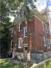 3217 W WELLS ST, a Queen Anne house, built in Milwaukee, Wisconsin in 1891.