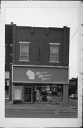 111 E OAK ST, a Commercial Vernacular retail building, built in Sparta, Wisconsin in 1913.