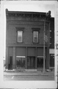 117 E OAK ST, a Italianate small retail building, built in Sparta, Wisconsin in 1890.