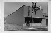 122 E OAK ST, a Commercial Vernacular small retail building, built in Sparta, Wisconsin in 1927.