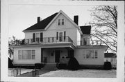 211 W OAK ST, a Queen Anne house, built in Sparta, Wisconsin in 1893.