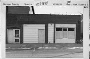 C. 125 W OAK ST, a Commercial Vernacular garage, built in Sparta, Wisconsin in .