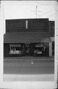 127 N WATER ST, a Commercial Vernacular small retail building, built in Sparta, Wisconsin in 1929.