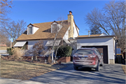 8864	Ravenswood Circle, a Colonial Revival/Georgian Revival house, built in Wauwatosa, Wisconsin in 1953.
