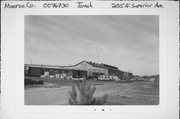 205 N SUPERIOR AVE, a Astylistic Utilitarian Building roundhouse/repair shop/car barn, built in Tomah, Wisconsin in 1907.