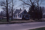 558 MAIN ST, a Cross Gabled apartment/condominium, built in Oconto, Wisconsin in 1870.