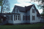 558 MAIN ST, a Cross Gabled apartment/condominium, built in Oconto, Wisconsin in 1870.