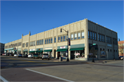 210-264 W GRAND AVE, a Late Gothic Revival large retail building, built in Wisconsin Rapids, Wisconsin in 1924.