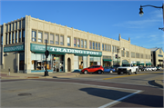 210-264 W GRAND AVE, a Late Gothic Revival large retail building, built in Wisconsin Rapids, Wisconsin in 1924.