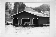 LAKE MINOCQUA, a Craftsman boat house, built in Minocqua, Wisconsin in 1920.