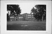 HEMLOCK ST, a Late Gothic Revival school – elem/middle/jr high/high, built in Woodruff, Wisconsin in 1918.
