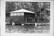 9276 HOWARD'S POINT RD ON LAKE MINOCQUA, a Craftsman boat house, built in Minocqua, Wisconsin in 1920.