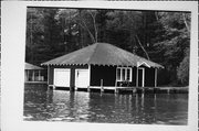 LAKE MINOCQUA, a Craftsman boat house, built in Minocqua, Wisconsin in 1920.