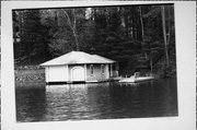 LAKE MINOCQUA LAKE MINOCQUA, a Craftsman boat house, built in Minocqua, Wisconsin in 1915.