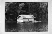9512 COUNTRY CLUB RD ON LAKE MINOCQUA 9512 COUNTRY CLUB RD ON LAKE MINOCQUA, a Queen Anne boat house, built in Minocqua, Wisconsin in 1913.