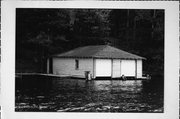 LAKE MINOCQUA, a Craftsman boat house, built in Minocqua, Wisconsin in 1930.