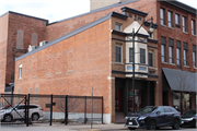 304 3rd St S, a Queen Anne small retail building, built in La Crosse, Wisconsin in 1847.
