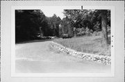 S OF COUNTY HIGHWAY J, a NA (unknown or not a building) wall, built in Woodruff, Wisconsin in 1937.