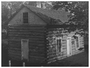 Antigo Public Library and Deleglise Cabin, a Building.