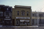 215 W COLLEGE AVE, a Italianate retail building, built in Appleton, Wisconsin in .