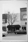 229 E COLLEGE AVE, a Commercial Vernacular small retail building, built in Appleton, Wisconsin in 1936.