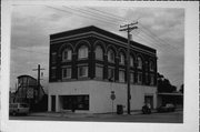 743 1/2-745 W COLLEGE AVE, a Romanesque Revival small office building, built in Appleton, Wisconsin in 1900.