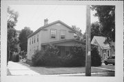 719 E WASHINGTON ST, a Greek Revival house, built in Appleton, Wisconsin in 1880.