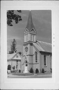 100 BLOCK OF MAIN ST AND POLK ST, NW CORNER, a Early Gothic Revival church, built in Hortonville, Wisconsin in 1892.