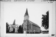 100 BLOCK OF MAIN ST AND POLK ST, NW CORNER, a Early Gothic Revival church, built in Hortonville, Wisconsin in 1892.