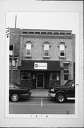 111 E 2ND ST, a Italianate retail building, built in Kaukauna, Wisconsin in 1884.