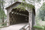 COVERED BRIDGE RD, 1 MI N OF INTERS OF STATE HIGHWAY 60 AND STATE HIGHWAY 143, a Other Vernacular wood bridge, built in Cedarburg, Wisconsin in 1876.