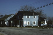 2635 N MEQUON RD, a Gabled Ell inn, built in Mequon, Wisconsin in 1855.