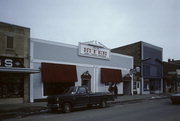 110 S MAIN ST, a Commercial Vernacular large retail building, built in River Falls, Wisconsin in 1890.