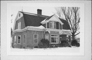 CHESTNUT ST, S, 209, a Dutch Colonial Revival house, built in Ellsworth, Wisconsin in .