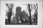 KINNICKINNIC AND S LOCUST, W CNR, a Late Gothic Revival church, built in Prescott, Wisconsin in 1934.