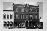 121-123 S MAIN ST, a Italianate large retail building, built in River Falls, Wisconsin in 1886.