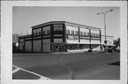 200 S MAIN ST, a Commercial Vernacular large retail building, built in River Falls, Wisconsin in 1916.