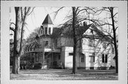 302 E WALNUT ST, a Queen Anne house, built in River Falls, Wisconsin in 1894.