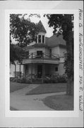 302 E WALNUT ST, a Queen Anne house, built in River Falls, Wisconsin in 1894.