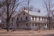 PIPE ROAD, 1/8 MI. EAST OF CH T, a Greek Revival house, built in Lanark, Wisconsin in 1853.