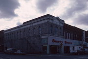 949 MAIN ST, a Italianate small retail building, built in Stevens Point, Wisconsin in 1877.