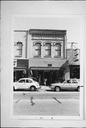 1040 MAIN ST, a Italianate small retail building, built in Stevens Point, Wisconsin in 1883.