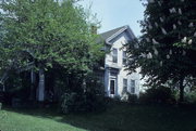 1221 N MAIN ST, a Greek Revival house, built in Racine, Wisconsin in 1855.