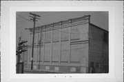 N SIDE CHESTNUT BETWEEN BRIDGE AND DODGE, a Commercial Vernacular warehouse, built in Burlington, Wisconsin in 1909.