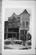 597 N PINE ST, a Queen Anne retail building, built in Burlington, Wisconsin in 1895.