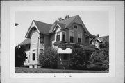 1128 ERIE ST, a Queen Anne house, built in Racine, Wisconsin in 1891.