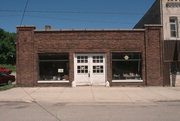 500 E MAIN ST, a Twentieth Century Commercial automobile showroom, built in Stoughton, Wisconsin in 1916.